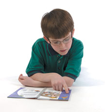 T&T boy reading handbook